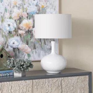 Set Of 2 White Ceramic Table Lamps With Etched Detailing And Drum Shades.