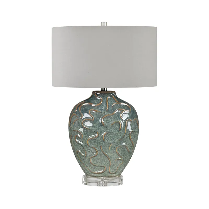Green And Brown Ceramic Lamp With Sculptural Body And Drum Shade.