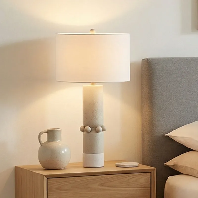 Modern Ceramic Table Lamp In Cream With White Linen Drum Shade