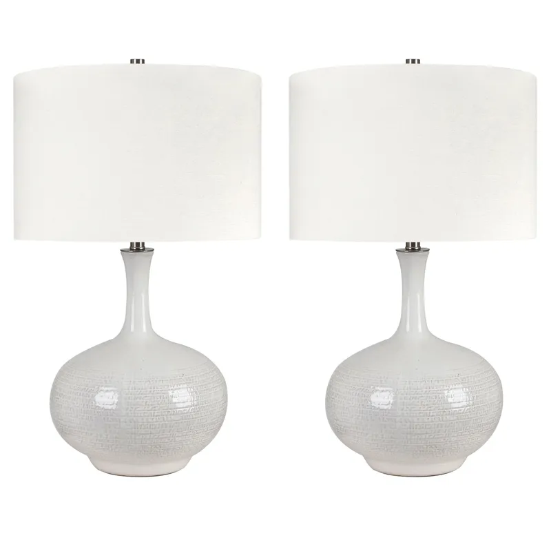 Set Of 2 White Ceramic Table Lamps With Etched Detailing And Drum Shades.