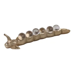 GOLD PEA POD STATUARY