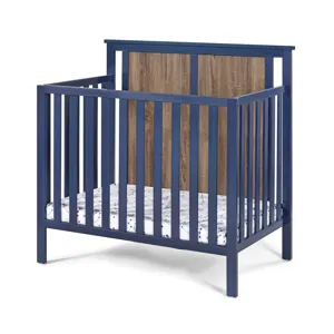 Connelly - Mini Crib With Mattress Pad Midnight - Blue / Vintage Walnut
