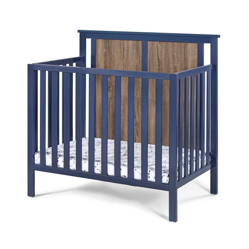 Connelly - Mini Crib With Mattress Pad Midnight - Blue / Vintage Walnut