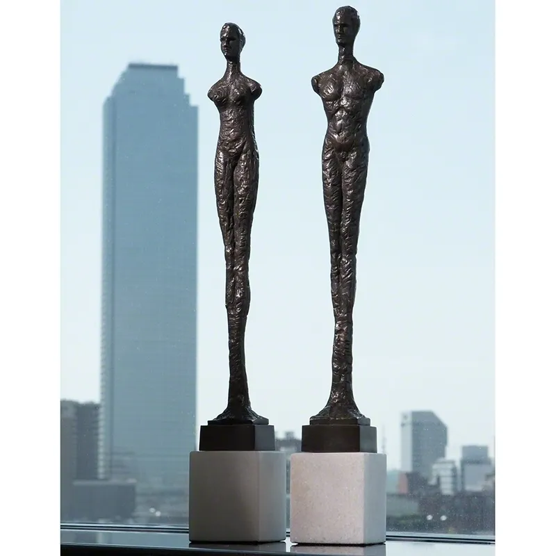 Pair of Contempo Statues-Black w/White Limestone