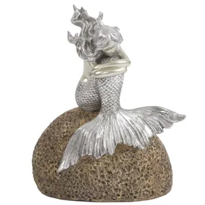 Mermaid On Rock Statue
