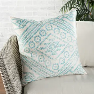 Groove by Nikki Chu Nikki Chu by  Malae Indoor/ Outdoor Tribal Turquoise/ Cream Throw Pillow 22 inch