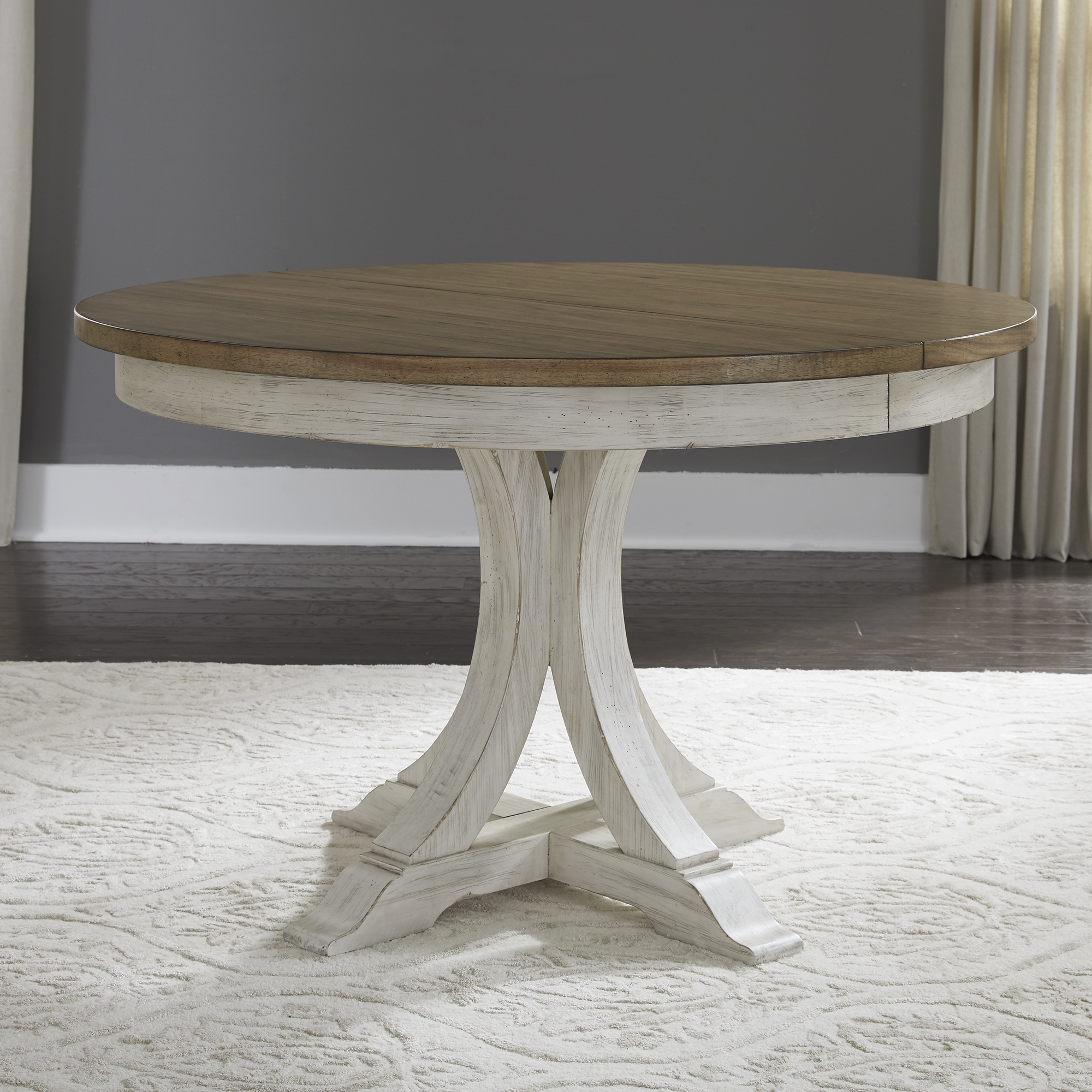 Farmhouse Reimagined Pedestal Table NIS486165657 at FurnitureLand