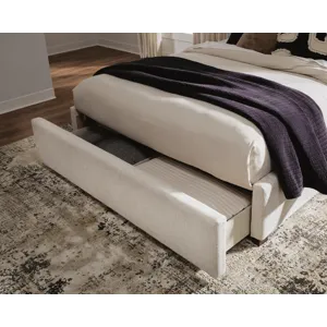 Shoralli Queen Upholstered Storage Bed
