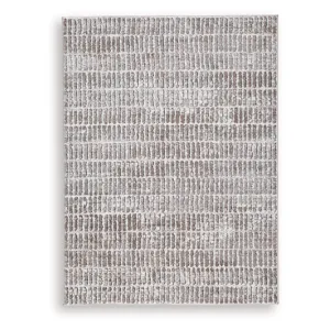 Fuadwick 5'3" x 7' Area Rug