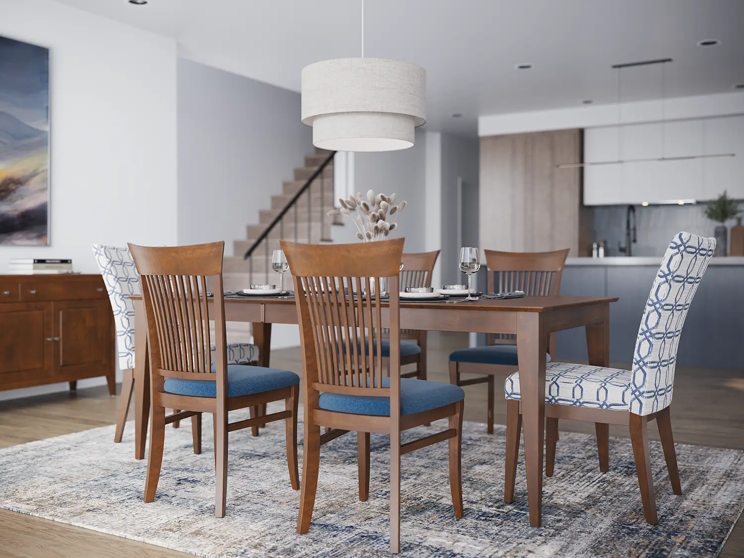 Canadel dining set with wood chairs and blue upholstered seats in an open-plan living space