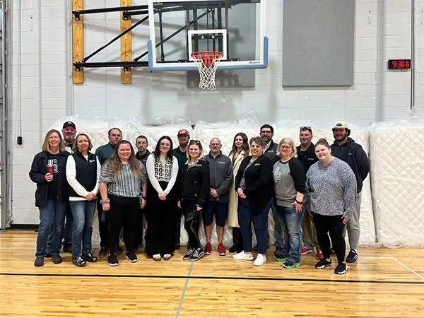 Group photo from basketball court