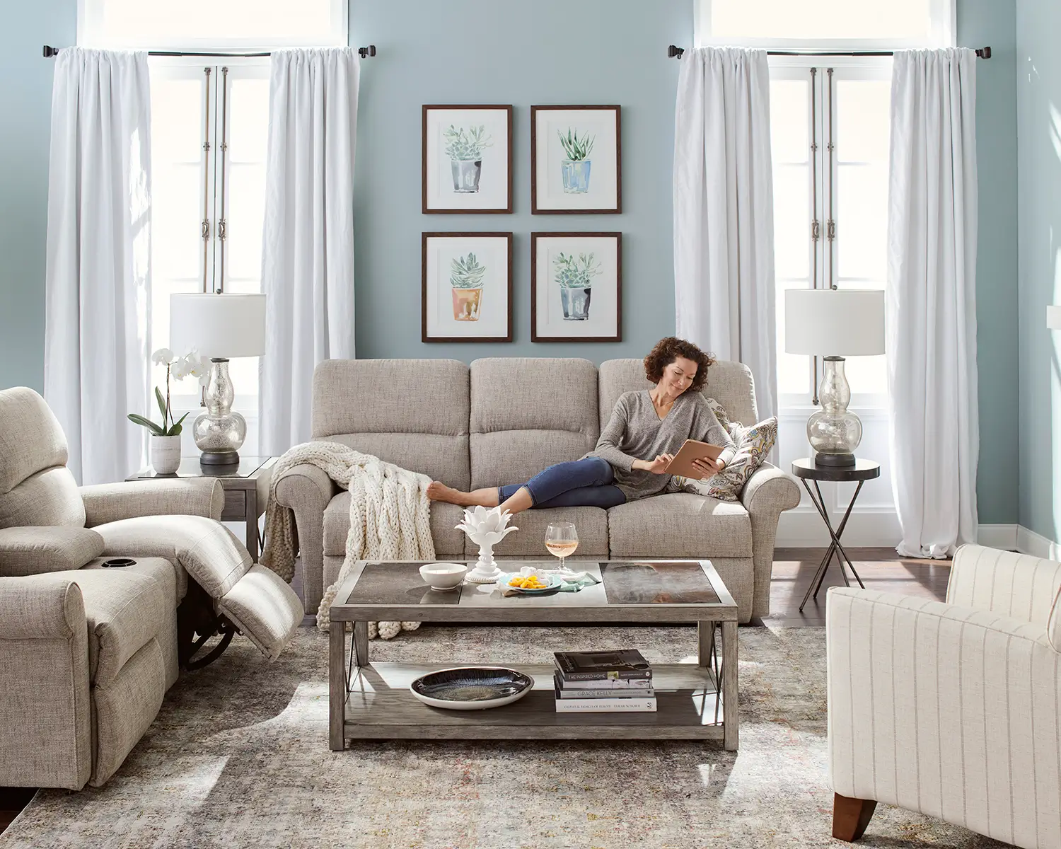 Woman reading on a La-Z-Boy sofa