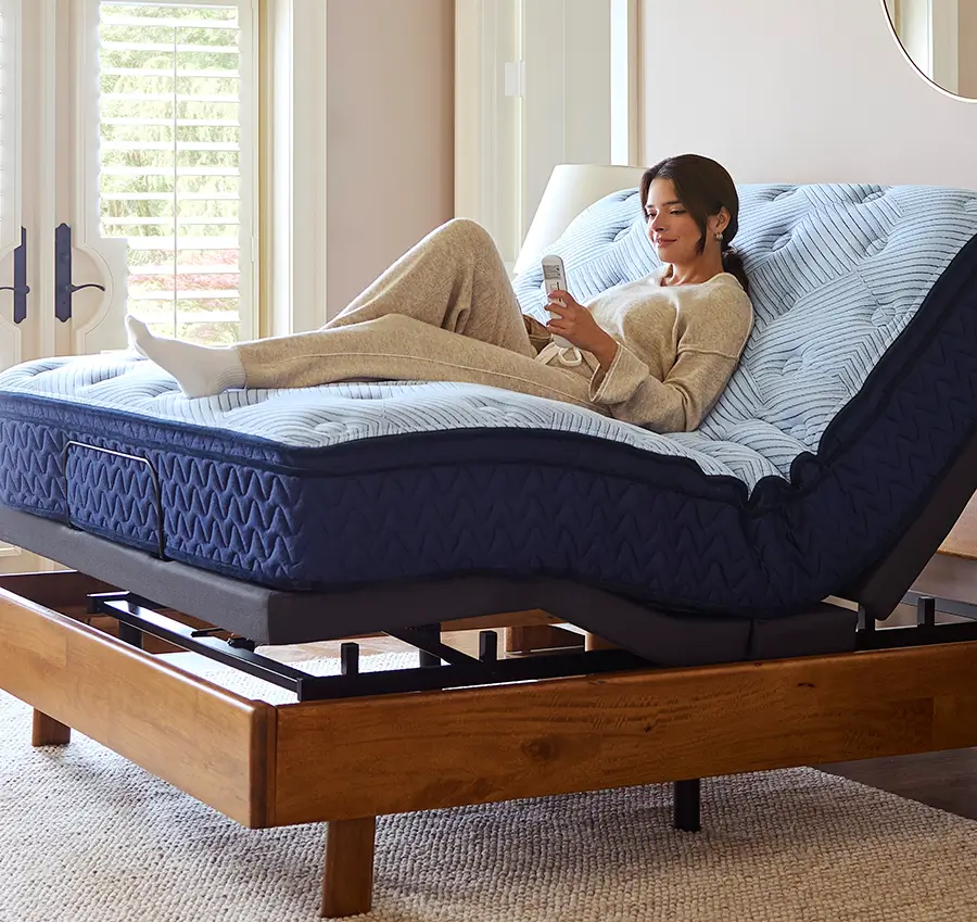 Woman relaxing on an adjustable mattress base