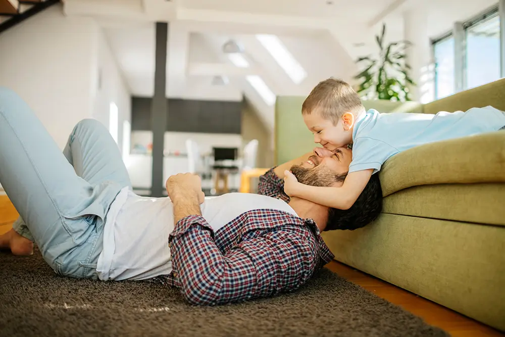 FAther playing with his son