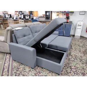 Contemporary Sleeper Sectional with Reversible Storage Chaise
