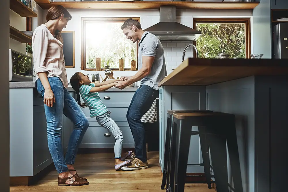 A family spending time together in a kitchen