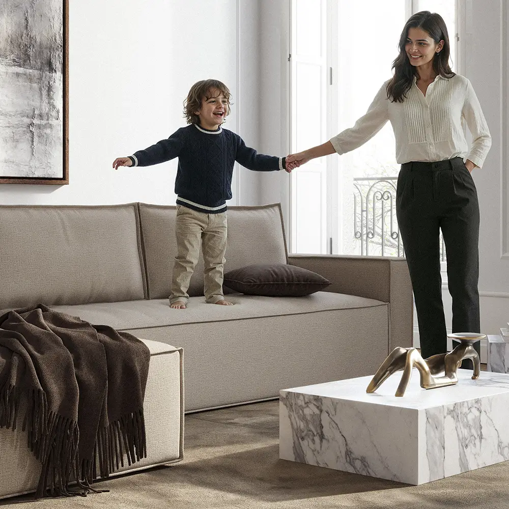 A mother and child enjoying a time together in the living room on a sofa protected by a furniture protection plan