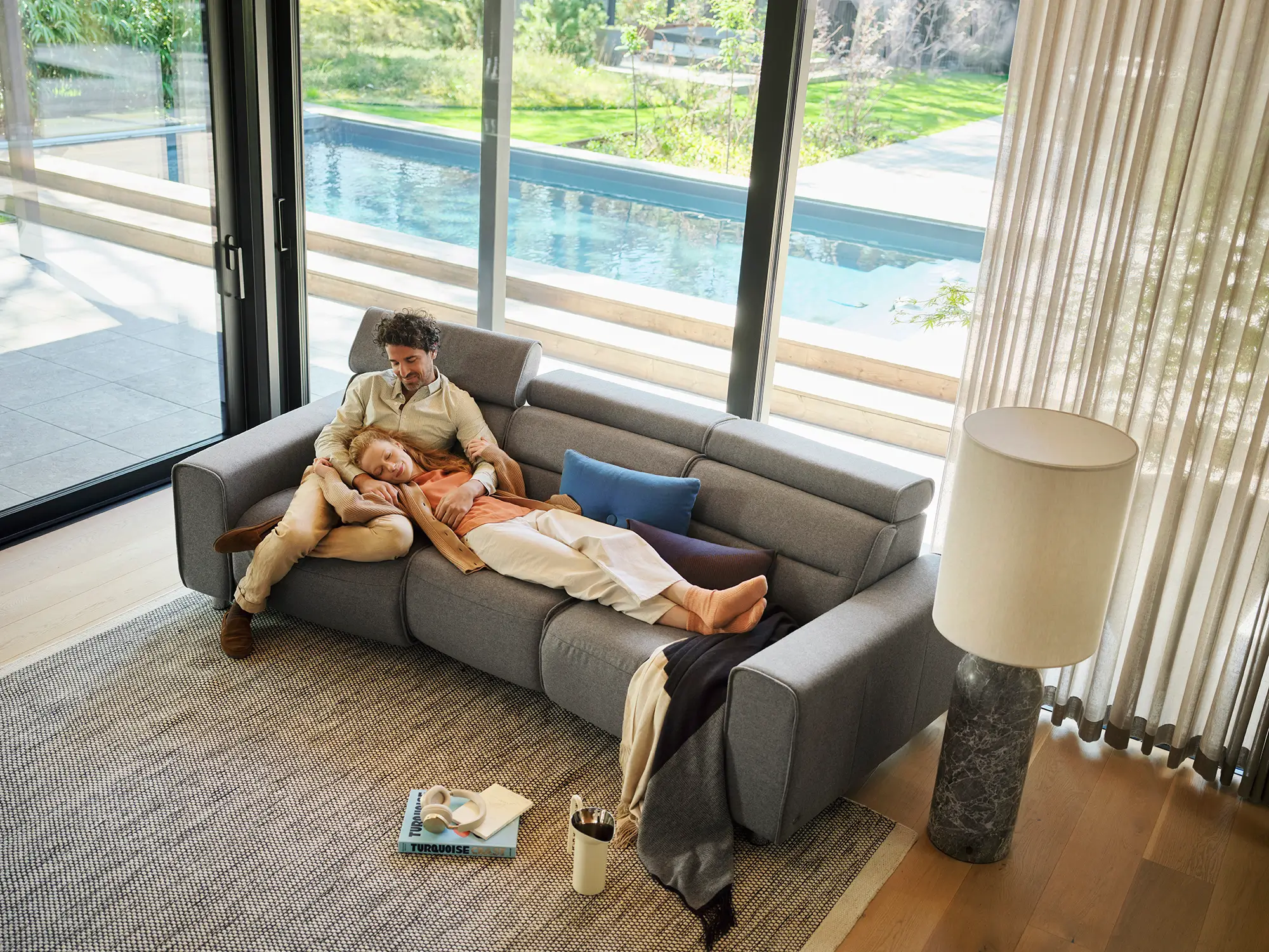 Couple relaxing on stressless sofa