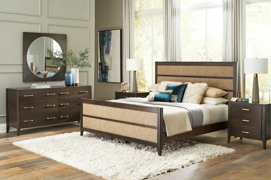 Bedroom set with an upholstered bed, dresser and nightstands