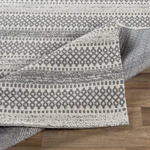 La casa 6'7" x 9' Rug