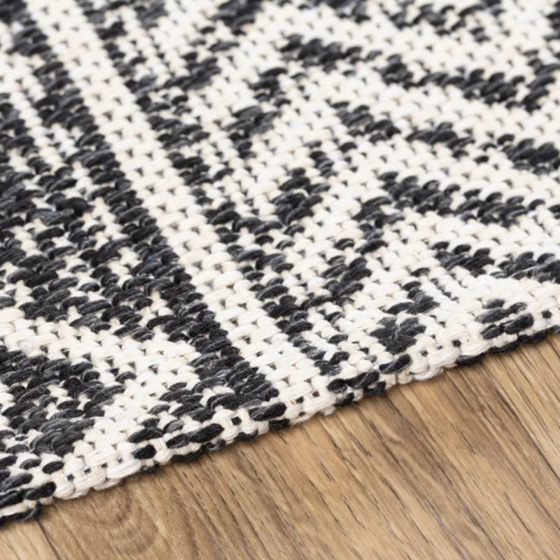 La casa 6'7" x 9' Rug