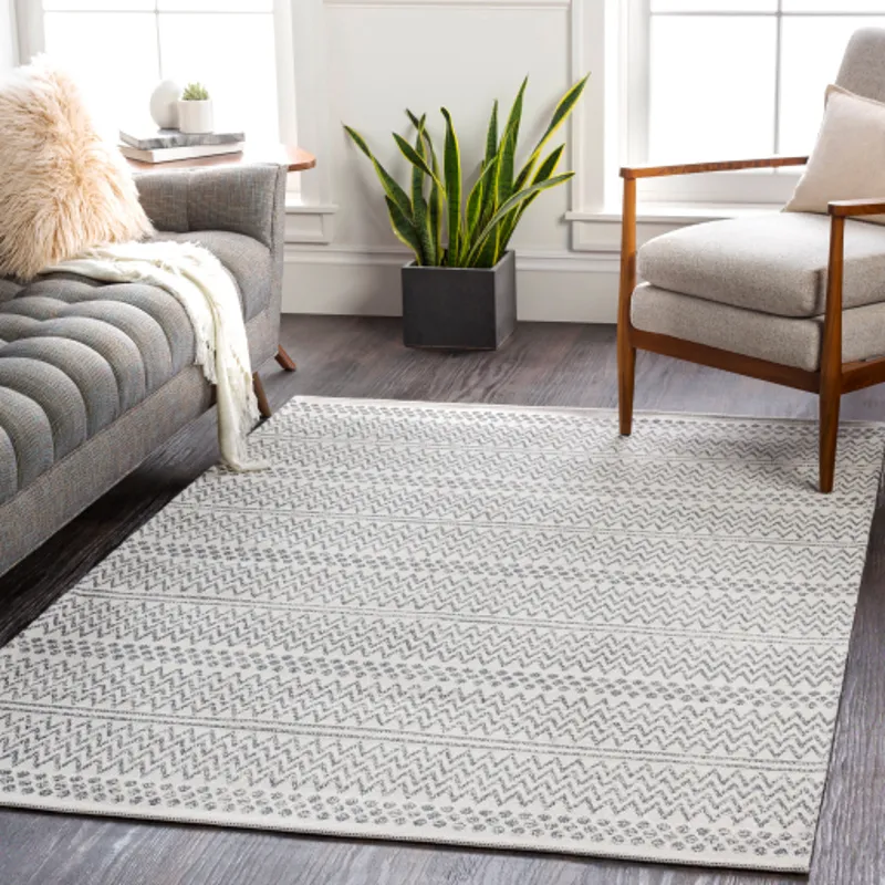 La casa 6'7" x 9' Rug