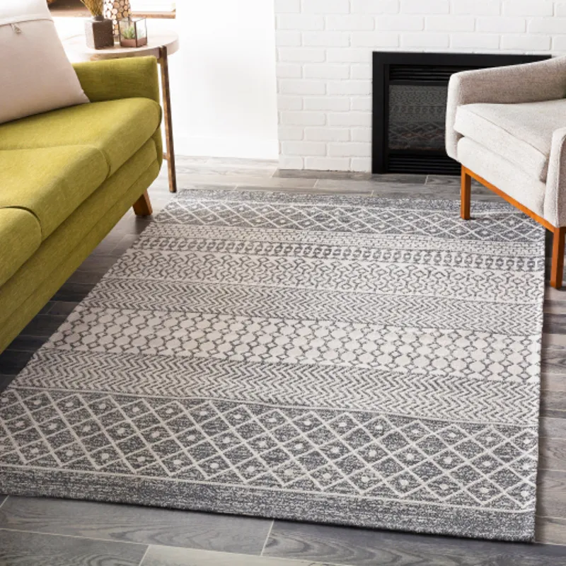 La casa 6'7" x 9' Rug