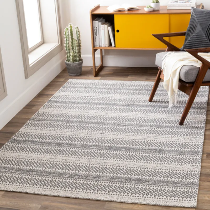 La casa 6'7" x 9' Rug