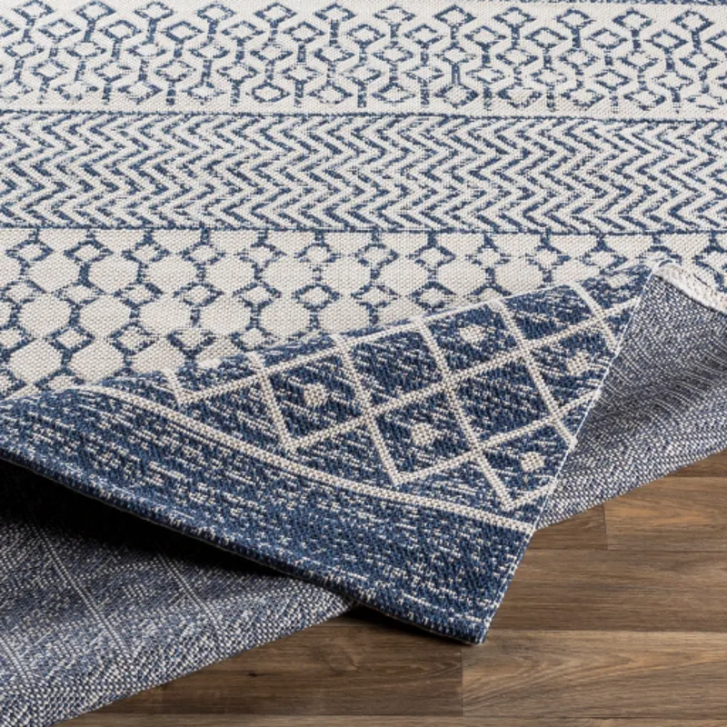 La casa 6'7" x 9' Rug