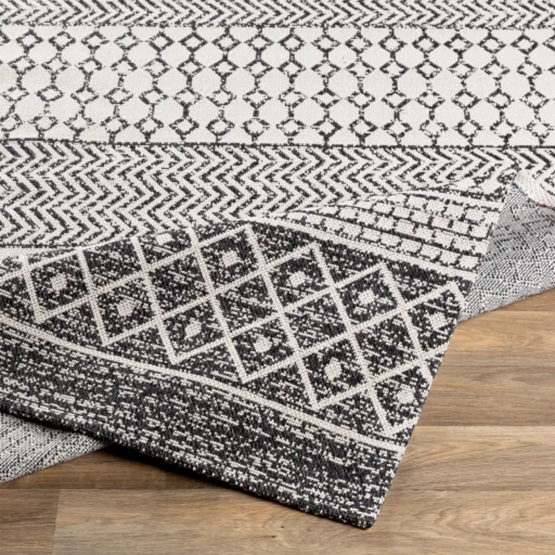 La casa 6'7" x 9' Rug