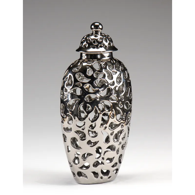 Pierced Jar With Lid